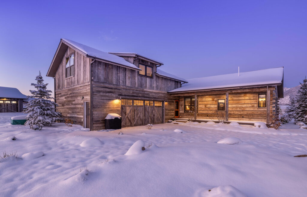 Custom mountain home exterior at twilight